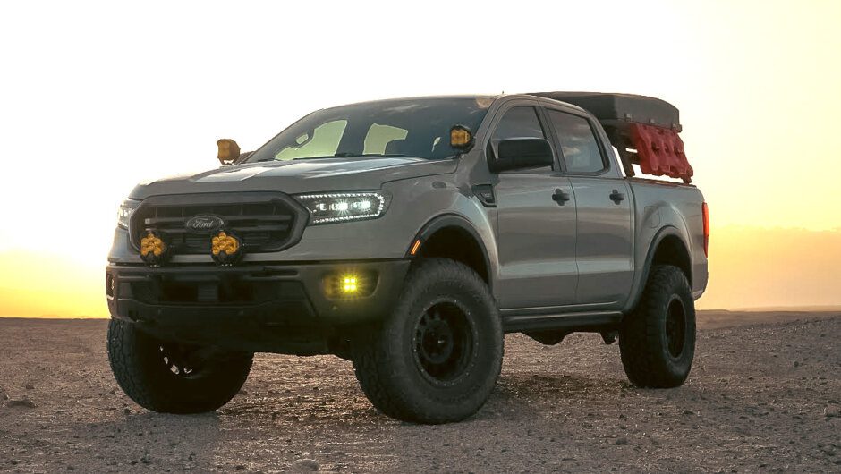 Grey Ford Ranger at sunset with Baja Designs lights in the desert