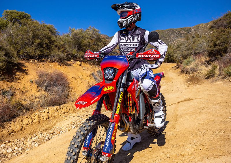 Red GasGas Motorcycle with Baja Designs light during the day